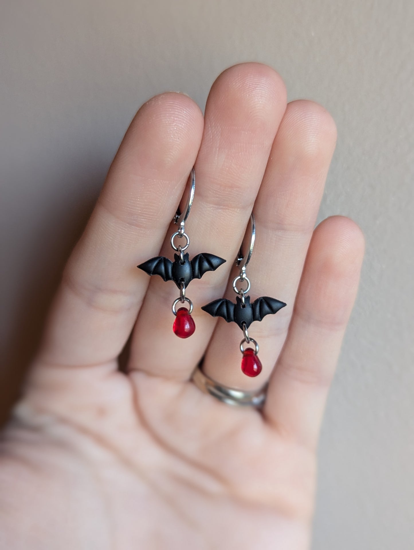 Bat Huggie with Red Glass Blood Drop