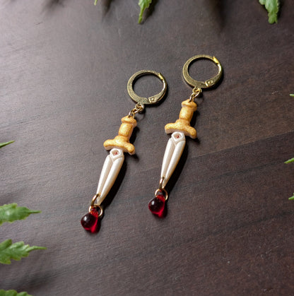 White and Gold Dagger with Blood Drop Dangle Earrings